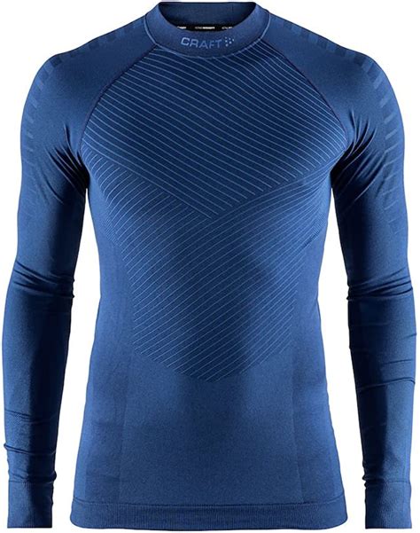 Craft sportswear. Long-sleeved garments. Long-sleeve running jersey and tights. Short- or long-sleeve baselayer top underneath a tee. Running jersey plus vest. Shorts and boxers with extra long legs for extra warmth around the thighs. Or a thin and wind-resistant running jacket worn over a tee plus tights. 
