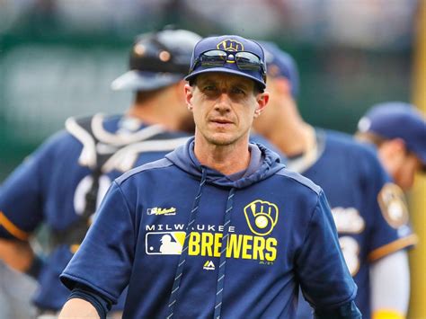 MILWAUKEE, WISCONSIN - SEPTEMBER 18: Manager Craig Counsell #30 of the Milwaukee Brewers walks to the dugout during the seventh inning against the San Diego Padres at Miller Park on September 18 ...