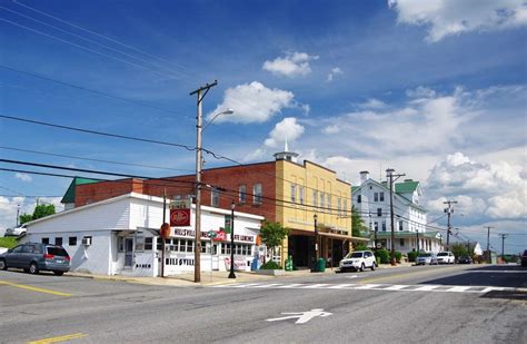 Hillsville is located in central Carroll County at (36.758814, −80.734510 U.S. Routes 52 , 221 and 58 intersect in the center of town. US 52 leads northwest 28 miles (45 km) to Wytheville and south 22 miles (35 km) to Mount Airy, North Carolina , while US 221 leads northeast 70 miles (110 km) to Roanoke and southwest 13 miles (21 km) to Galax .. 
