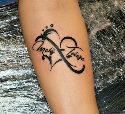 Feather infinity tattoo with names on forearm. Forearm tattoo with an infinity symbol with feather and birds. ... Arrow infinity tattoos are a common design that stands for the idea that there are no limits to what you can do. This tattoo is a mix of two strong symbols: the arrow, which stands for direction, and the infinity sign, which stands .... 