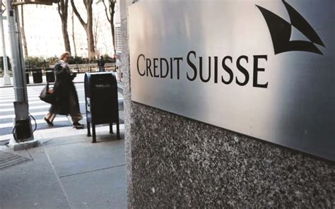 Credit Suisse shares fall, but UBS deal raises hope on banks