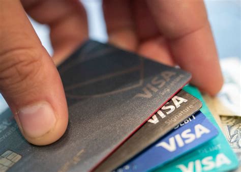 Credit card debt among Americans hits $1 trillion
