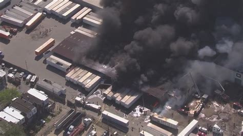 Crews Battle Large Warehouse Fire In Superior, Wisconsin