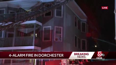 Crews battle 4-alarm fire in Dorchester that led to porch collapse