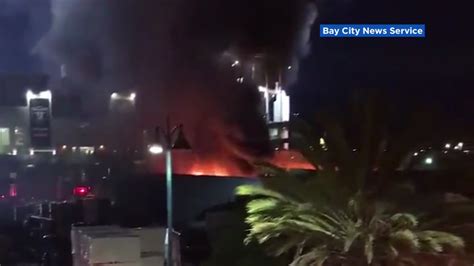 Crews battle blaze on park district land near Oakland Coliseum, I-880