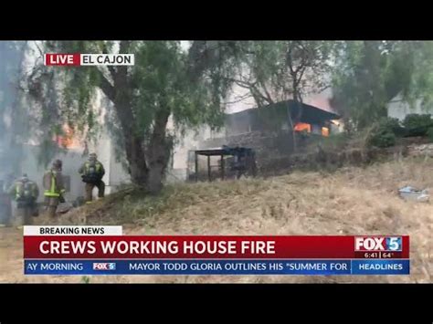 Crews battle building fire in El Cajon