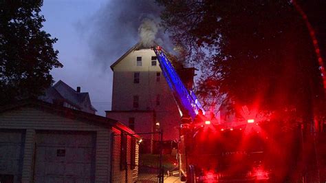 Crews battle house fire in Lowell