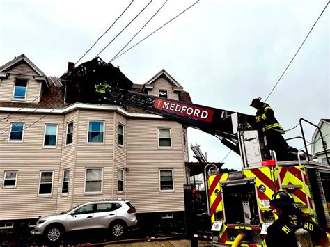 Crews battle massive fire at Medford home