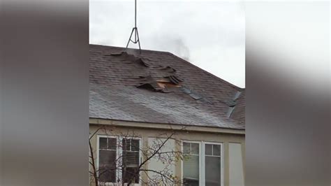 Crews believe lightning strike sparked house fire in Milton, leaving large hole in roof