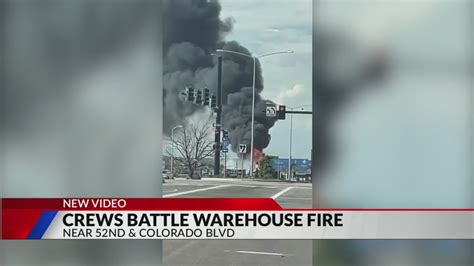 Crews fighting abandoned warehouse fire in Denver