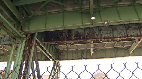 Crews seen cleaning up lead-filled paint chips falling from Tobin Bridge in Chelsea