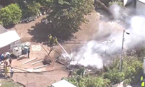 Crews work to put out tractor trailer fire at animal farm in NW Miami-Dade