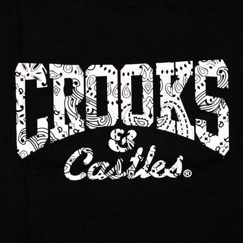 Crooks and castles. The Crooks and Castles brand is all about hustlin’ and getting loot, so the Monopoly collaboration makes sense. The Crooks and Castles x Monopoly Collection is available online at Karmaloop.com. This Los Angeles-based brand quickly emerged on the streetwear scene as a go-to for hats, shirts, pants, outerwear, and accessories. 