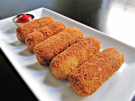 Croquetas cuban. Welcome back everyone! Today we bring you this amazing Cuban appetizer recipe, Cuban Croquettes!! This appetizer was my brother’s Ian’s first food!😱 They ... 