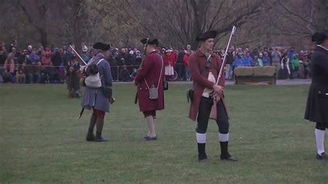 Crowd gathers for reenactment of the Battles of Lexington and Concord on 248th anniversary