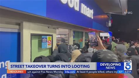 Crowd takes over street, loots gas station in Compton 
