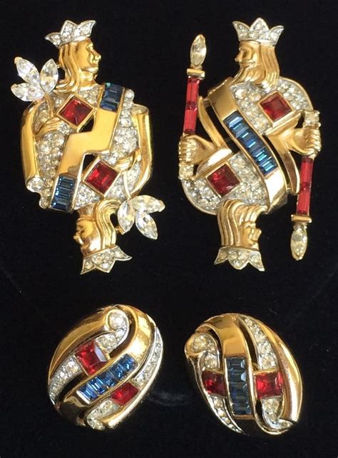 Description: gold plated sterling, rhinestones, enamelling Marked: Trifari with Crown, Sterling (all pieces); King, Des Pat No 140844; Queen, Des Pat No 140843; Knight Des Pat No 140855 Reference: Brunialti, American Costume Jewelry - Art and Industry (2008) Vol 2 p 134.Patents are reproduced below (scroll down), designer A Philippe, all three filed 20 Jan, granted 10 Apr 1945.. 