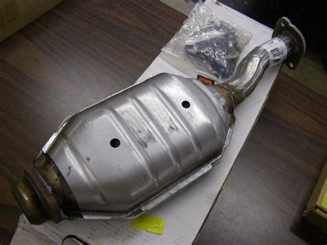 Crown vic catalytic converter. A catalytic converter can turn red hot due to an overabundance of fuel being burned in the exhaust system. This occurs when excessive hydrocarbons are introduced into the exhaust, causing the converter to work harder to burn off the excess fuel. The increased burning creates excessive heat, leading to the red-hot glow. 