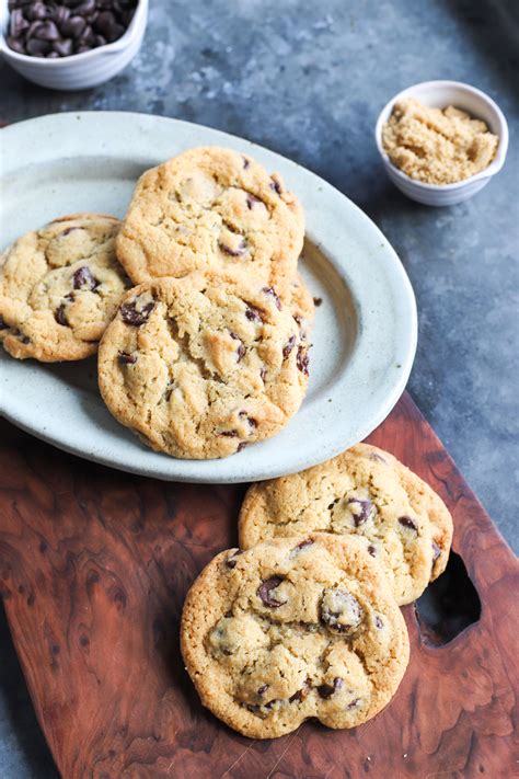 Crunchy chocolate chip biscuits. Preheat oven to 180 C (350 F) standard / 160 C (320 F) fan-forced. Line two baking trays or cookie sheets with baking or parchment paper. In a large mixing bowl, add the butter and sugars and beat using an electric beater on medium speed for a minute or two until smooth and creamy. 