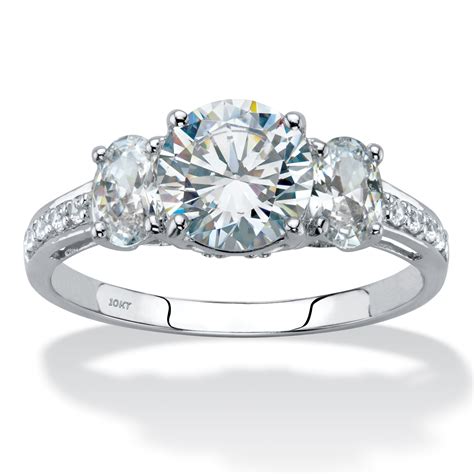 Cubic zirconia engagement ring. Cubic Zirconia Engagement Ring- 3.0 TCW Three-Stone Oval Cut with Woven Prongs. $367.52 USD – $8,536.98 USD. Buy in monthly payments with Affirm on orders over $50. Learn more. This three-stone oval-cut CZ engagement ring K.O.'s other envious engagement rings with its unique 1,2,3-stone oval cut punch. 