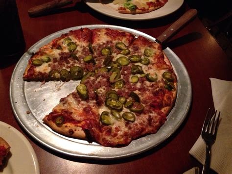 Best Pizza in Grand Ledge, MI 48837 - Cugino's, Peppino's Pizza Of Grand Ledge, Fabiano's Grocery & Deli, Slice by Saddleback, Pizza Hut, Mancino's Grinders & Pizza, Hungry Howie's Pizza, Little Caesar's Pizza, Sir Pizza, Rudino's Pizza & Grinders.
