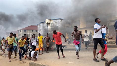 Curfew in Sierra Leone after gunmen attacked the main military barracks and detention centers