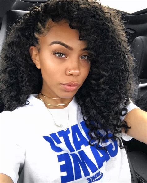 The bigger and bolder twists are a cute take on the kinky style. With this kinky twists look, you can part your hair over to either side of your head, finishing the kinky twists look by pulling your hair to one side of your head. 14. Kinky Bun with Side Swoop Bang. Source: carlyne_m – instagram.com.. 