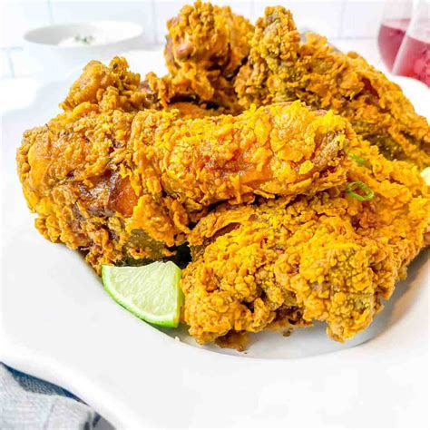 Curry fried chicken. Cover the bowl with cling wrap and keep in the fridge. Heat the oil in a pan over medium heat. Place coated chicken pieces into the pan gently, using tongs, to avoid splashing oil. Fry the chicken, flipping each piece every 5 minutes. Cook until the … 