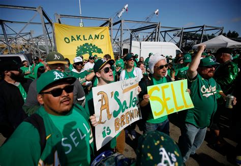 Cursing John Fisher, Oakland A’s fans hold out hope their team stays put