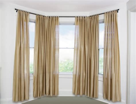Curtain rod for bay window. New bay window curtain rods are perfect for mounting valances and curtains over bay windows. Each side is adjustable from 20 to 36 and the centerpiece adjusts from 38 to 72 also has a double bay window curtain rod. Material: Metal; Rod Diameter: 0.81'' 