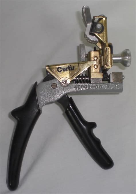 Curtis key cutter model 15 manual. - Johnson 112 outboard motor owners manual.