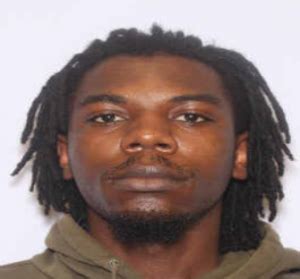 According to police, Curtis Townsend, 21, is believed to have shot Massey during an argument before throwing the gun and hiding in an outside trash can. He was located and taken into custody. "One siren after another after another," says Rita Coleman, who lives in the neighborhood and has for 15 years.