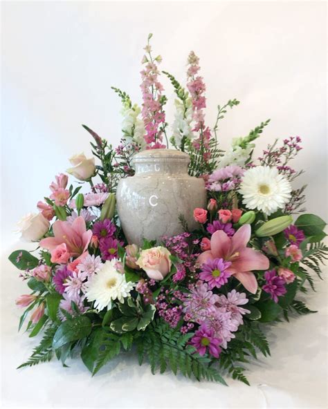 Custom funeral flowers.  Work with us to create a custom floral arrangeme...