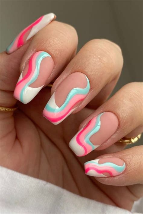 Cute summer nails not acrylic. Aug 1, 2023 · Columbus-based nail artist Adorea Rhodes used a water-marbling technique to mix the vibrant colors in this manicure. These nails truly look like works of art with expertly swirled shades of yellow ... 