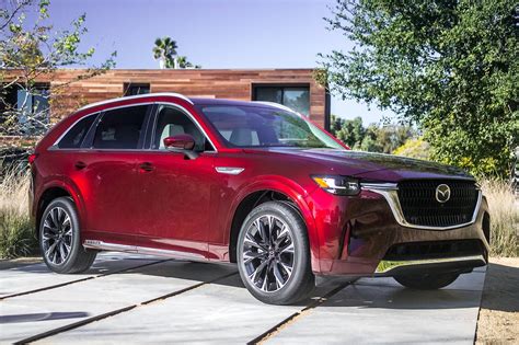 Cx 90 review. The CX-90's chassis features a longitudinal engine layout, a 90-degree shift from the CX-9's transverse setup. Mazda claims this new arrangement will give the CX-90 additional handling chops. 