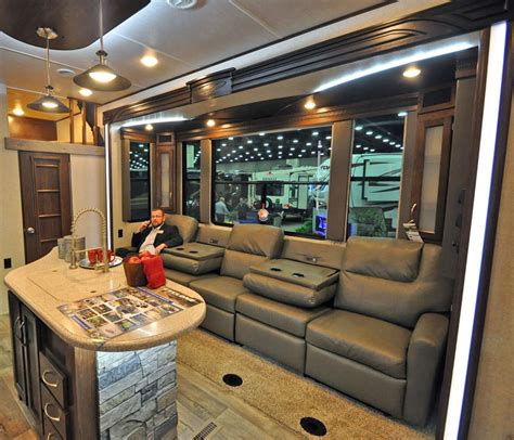 Cyclone rv inside. When it comes to interior features, the Cyclone does it right with the industry’s only king bed tilt slide system! The garage facing lofts will allow you to have extra room for your friends and family to sleep on, and when you’re on the road, put your favorite outdoor gear back there! 