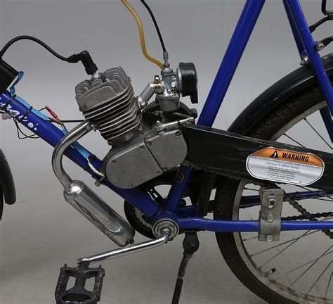 Cykel med påhängsmotor ginza
