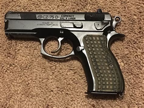 CZ-75 P01 Omega in 9mm with two factory magazines and an MSRP of $627. (Photo: Francis Borek) ... The grips are checkered black rubber, and lend the P-01 a very comfortable grip. As we all know .... 