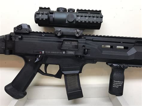 Discontinued 2022. Falling somewhere between the Scorpion Pistol and Carbine is this oddity. Strange though it may be, it's perfectly set up for those who desire a two-stamp gun. The extended forend from the Carbine will hide most 9mm and hybrid cans, while offering M-LOK attachment points and boosting the sight radius a good deal.. 