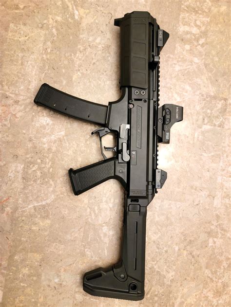 Cz scorpion suppressor.  The integrated M18x1 direct thread mount attaches...