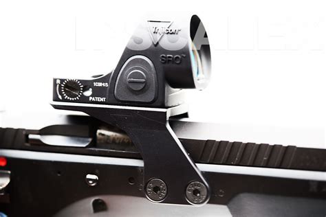 Czechmate cmore mount.  Allows mounting of following red dots Trijicon R...