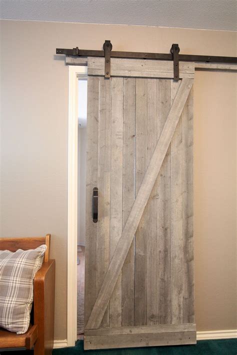 DIY Barn Doors How to Build a Sliding Barn Door... for cheap!! Diy
