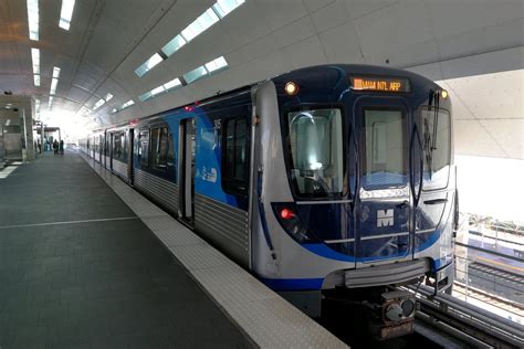 The Metrorail system is a 25-mile dual track that provides service to Miami International Airport (MIA) and runs from Kendall through South Miami, Coral Gables, and downtown Miami; to the Civic Center/Jackson Memorial Hospital area; and to Brownsville, Liberty City, Hialeah, and Medley in northwest Miami-Dade, with connections to Broward and Palm …. 