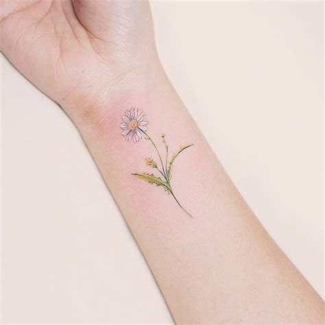 Daisy wrist tattoo. 8. sunflower chest tattoo. 9. Wrist Sunflower Tattoo. For decades, the wrist has been one of the most popular tattoo locations. ... or a godchild. On the other hand, the sunflower-and-daisy tattoo might serve as a link to the wearer's childhood, recalling a period when they were carefree and innocent. 24. minimalist sunflower tattoo. 25 ... 