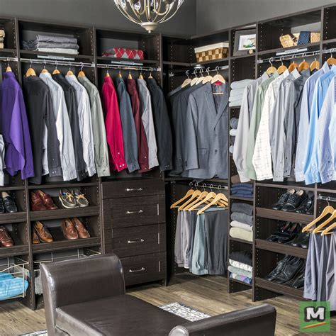 Make your closet your favorite space in the house with this elegant charcoal floor-standing closet by Dakota Closets™. This closet features soft-close drawers, doors, hardware pulls, shelves to store clothes, a pants rack, and wardrobe rods for hanging c lothes. The four drawers feature soft-close drawer slides and shaker drawer fronts for added style.. 