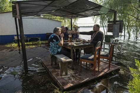 Damage to Russian-occupied dam submerges Ukrainian reservoir island community