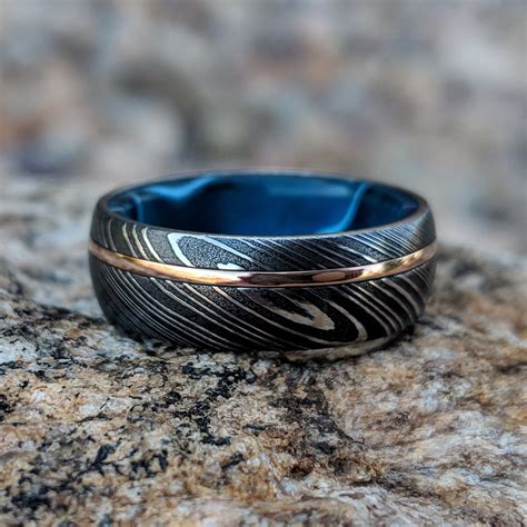 Damascus ring. Explore our collection of Damascus wedding rings and find the perfect Damascus Steel Ring for you. 10 products. Custom Twisted Damascus Glowstone Ring. $385.00. Custom Birthstone Ring with Glowstone. $295.00. Matching Custom Glowstone Wedding Ring Set. $595.00. Custom Boundless Glowstone Ring. 