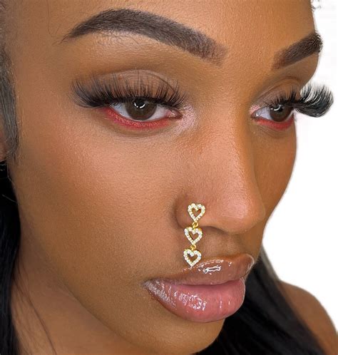 Dangling nose piercing. Things To Know About Dangling nose piercing. 