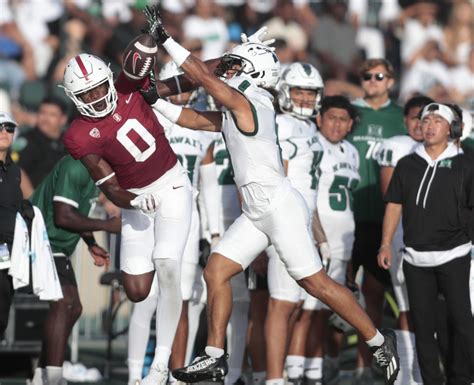 Daniels guides Stanford to 37-24 win over Hawaii in opener