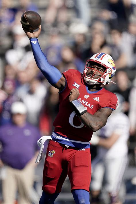 In his first start of the season, Daniels went 21-for-30, with 202 passing yards and three touchdowns, plus a clutch two-point conversion throw in overtime to KU’s breakout walk-on Jared Casey.. 